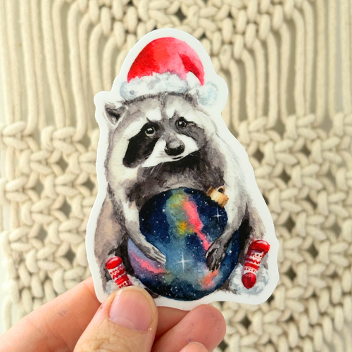 Sticker - Racoon with a galaxy ornament